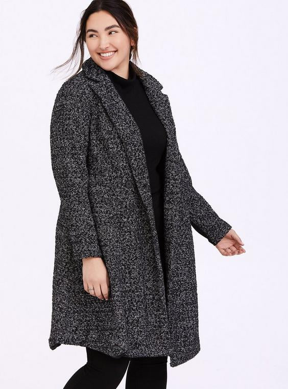 a women wearing a winter coat, picture for our retailers consignment program