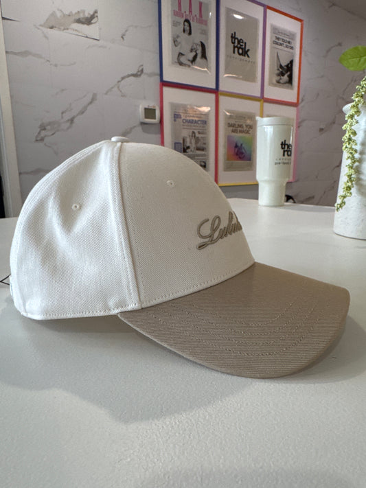 lululemon baseball hat, lululemon hat, lululemon cap, lululemon unisex hat, unisex baseball cap, cream baseball hat, beige baseball hat, neutral baseball cap, embroidered logo hat, adjustable baseball hat, athletic hat, workout hat, casual hat, everyday hat, women’s hats, men’s hats, Sherwood Park consignment, Sherwood Park shopping, Edmonton consignment, secondhand shopping, women’s consignment store