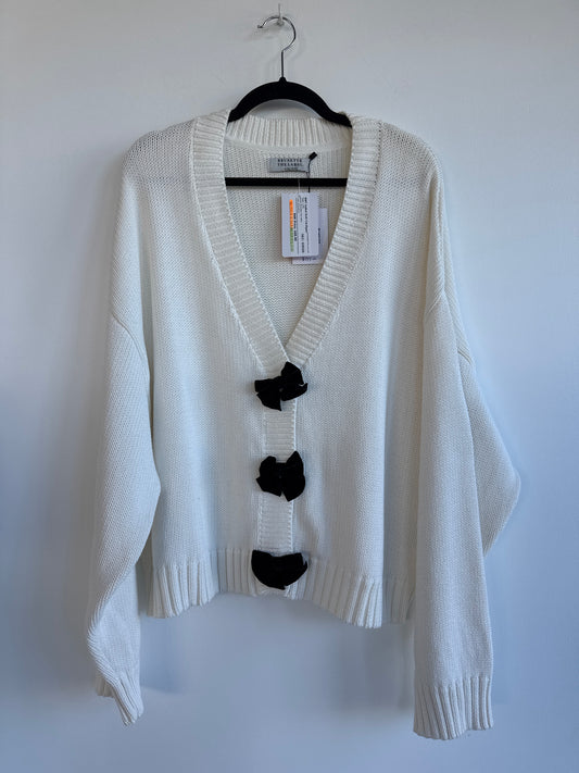 Brunette the Label cardigan, Isabella Knit Cardigan, Brunette the Label Isabella, oversized cardigan, oversized knit cardigan, cotton cardigan, women’s cardigan, black velvet bow cardigan, bow cardigan, holiday cardigan, Christmas cardigan, winter cardigan, statement cardigan, cozy cardigan, new with tags, Sherwood Park consignment, Sherwood Park shopping, consignment store Sherwood Park, Edmonton consignment, secondhand shopping, women’s clothing consignment, secondhand clothing, sustainable fashion