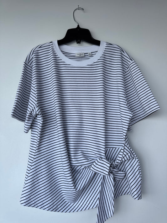 A short-sleeve crewneck t-shirt with thin black horizontal stripes on a white background, hanging on a black hanger against a plain light gray wall. Aritzia. Short sleeve tee. Sherwood Park consignment, Sherwood Park shopping, consignment store Sherwood Park, Edmonton consignment, secondhand shopping, secondhand clothing, women’s consignment, women’s clothing consignment, curated consignment, quality secondhand clothing, pre-loved clothing, thrift shopping, sustainable fashion, local shopping, Alberta consi