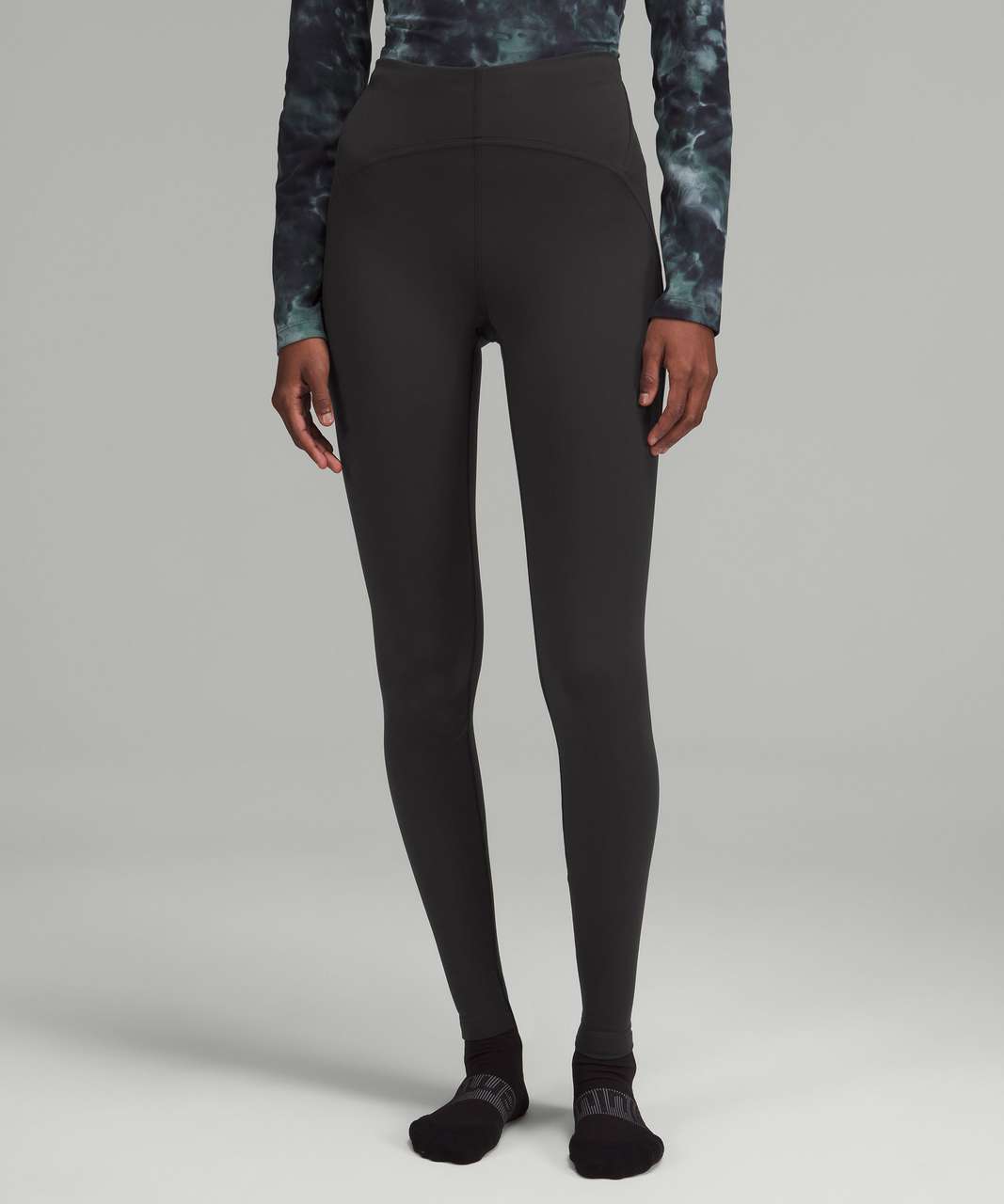 A model from the waist down wearing Lululemon high-waisted black leggings, Sherwood Park consignment, Sherwood Park shopping, consignment store Sherwood Park, Edmonton consignment, secondhand shopping, secondhand clothing, women’s consignment, women’s clothing consignment