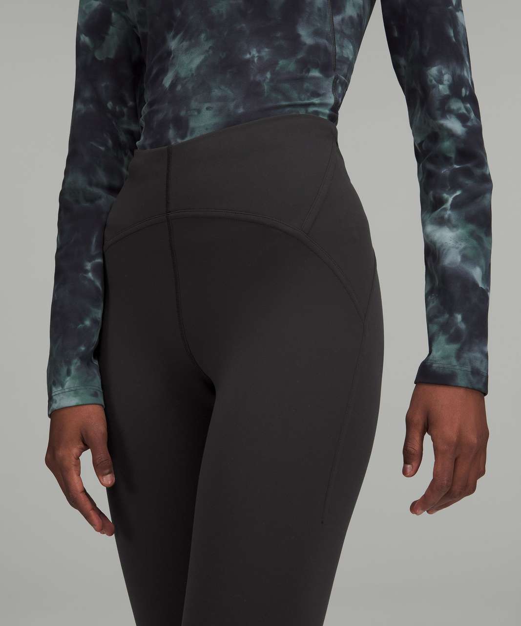 Close-up of a model wearing high-waisted black Lululemon leggings Sherwood Park consignment, Sherwood Park shopping, consignment store Sherwood Park, Edmonton consignment, secondhand shopping, secondhand clothing, women’s consignment. Lululemon for cheaper. Fall styles in Sherwood Park.